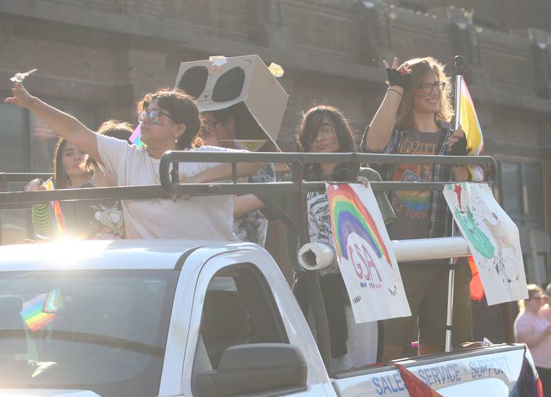 Students ride the gay straight alliance float during the L-P homecoming parade on Thursday, Oct. 2, 2025 downtown Peru.