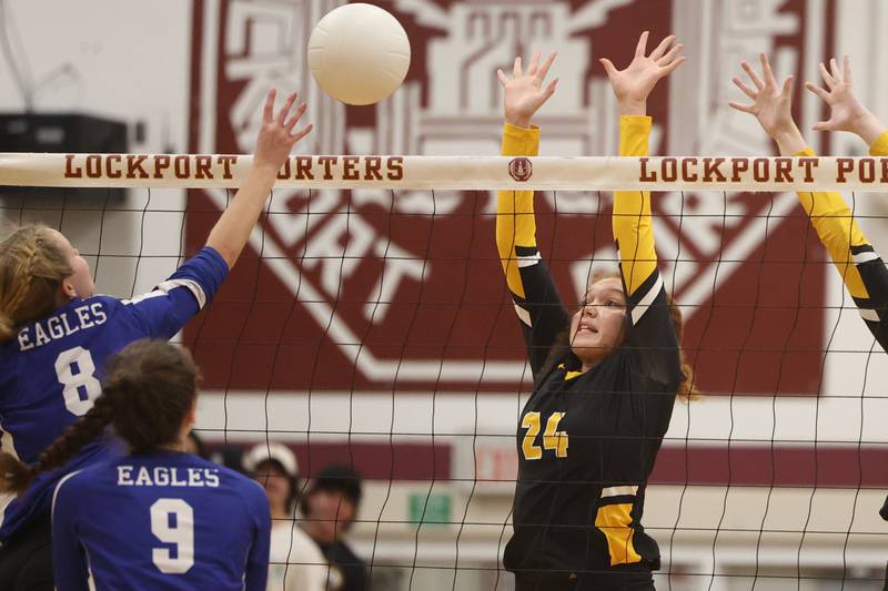 Joliet West’s Natalia Harris goes for the block against Sandburg in the in the Class 4A Lockport Sectional title match on Wednesday.