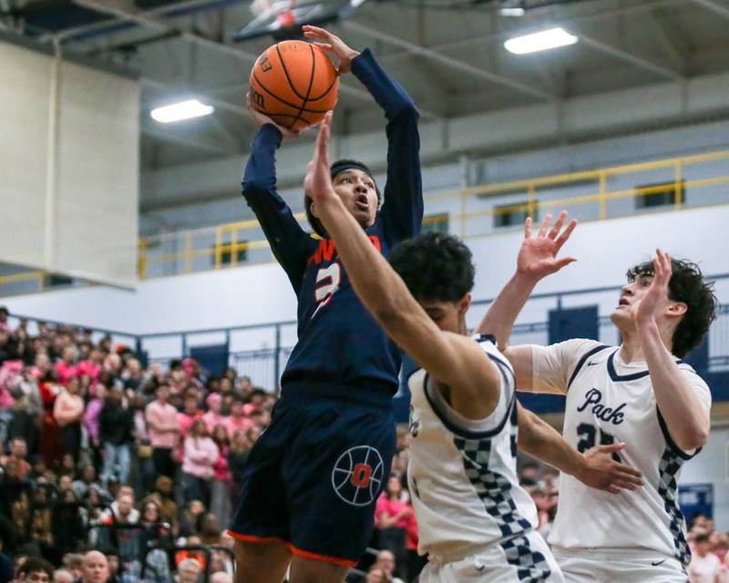 Oswego's Ethan Vahl (3) puts up a shot during their basketball game between Oswego at Oswego East, Feb 13, 2026 in Oswego.