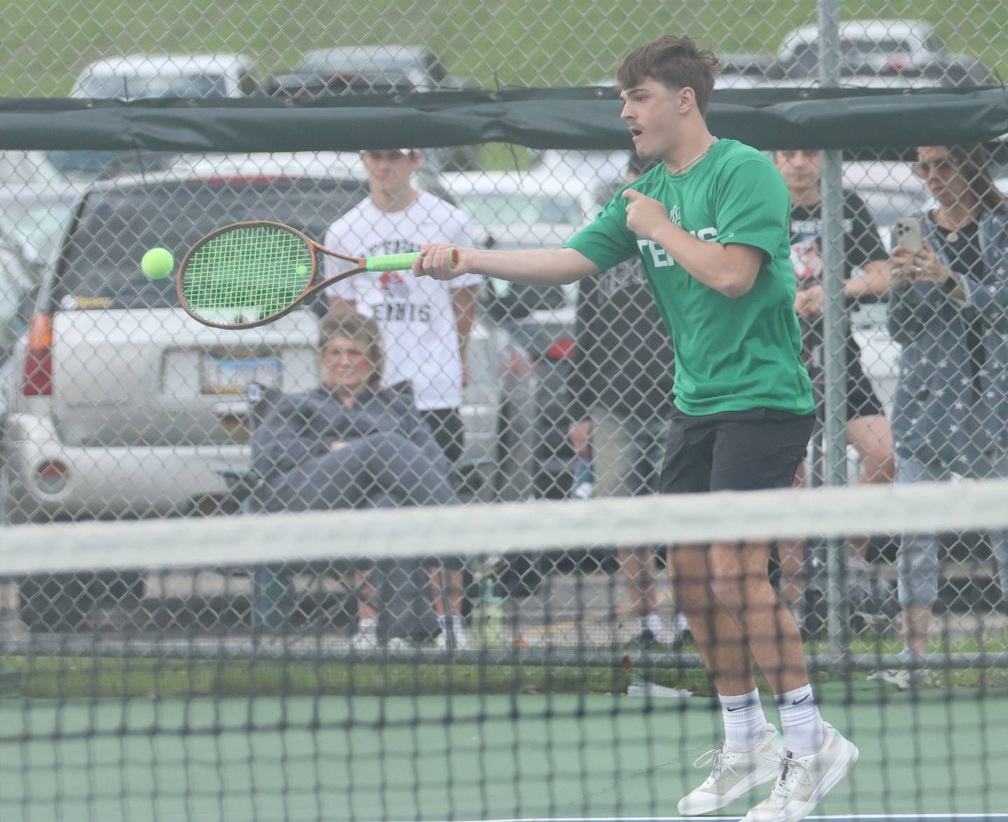 L-P's Evan Downey returns a serve on Tuesday, April 21, 2026 in the Henderson-Guenther Tennis Facility at Ottawa High School.