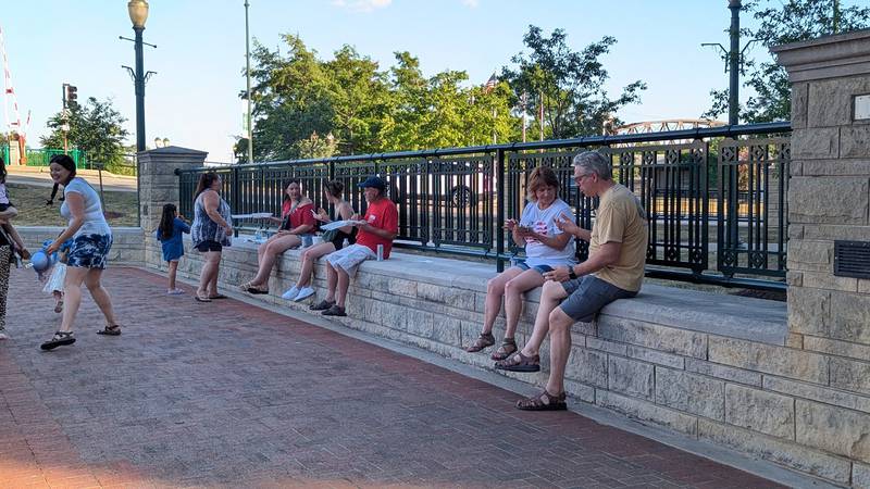 Attendees at the Independence Celebration on Thursday, July 3, 2025, at the Billie Limacher Bicentennial Park & Theatre in Joliet, enjoy music, food, and conversation.