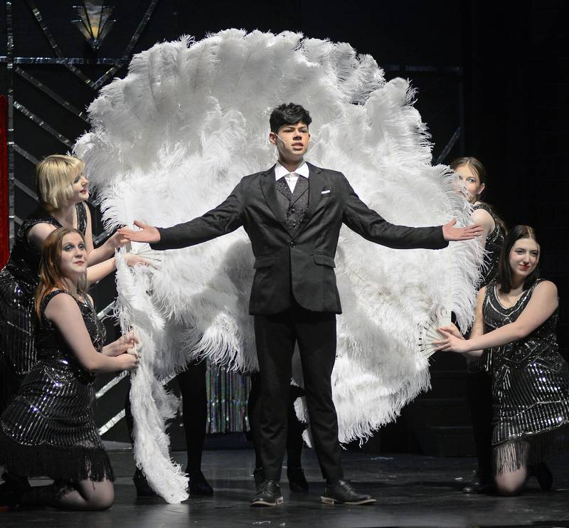 Lucas Fraga, playing Billy Flynn (center), rehearses a scene from Streator High School's performance of "Chicago," along with (left back) L Smith, Keirsten Burgess and (right) Natalie Hudson.