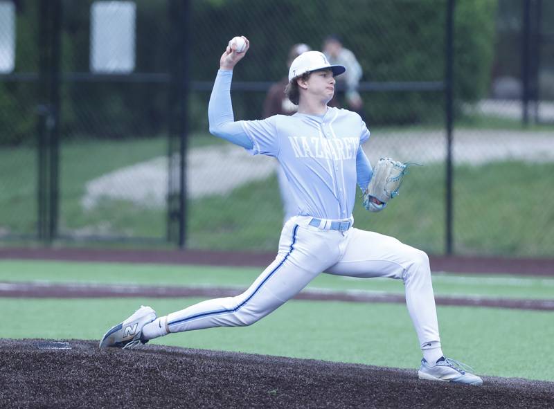 Nazareth's James Wasson III (31) pitches during the varsity baseball game on Wednesday, April 20, 2025 between Nazareth and Joliet Catholic academies in La Grange Park.