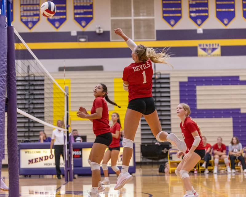 Charlie Pellegrini of Hall High School spikes the ball over the net against Mendota during the match at Auxiliary Gym on September 2, 2025 at Mendota High School.