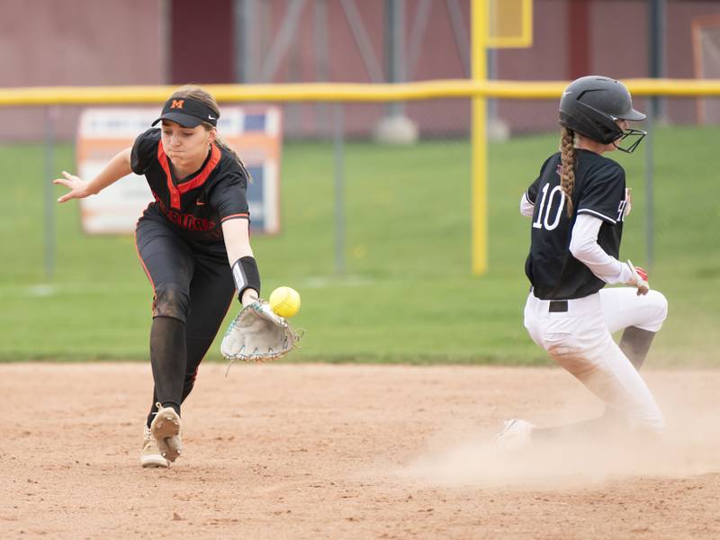McHenry's Elyse Fullington misses a catch as Huntley's Katelyn Bayness slides into second base safe during their game on Wednesday, April 30, 2025 at Huntley High School. Ryan Rayburn for Shaw Local