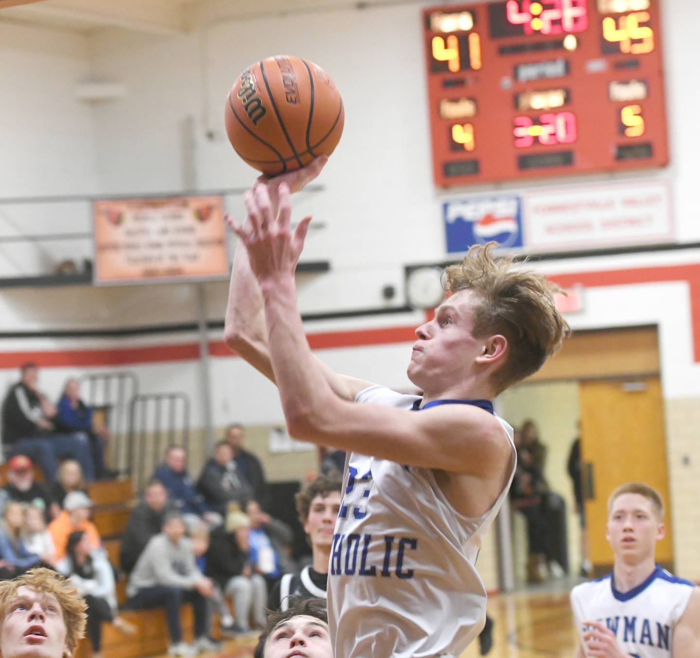 Newman's Luke Simpson shoots during fourth quarter action against Byron at the Forreston Holiday Tournament on Monday.