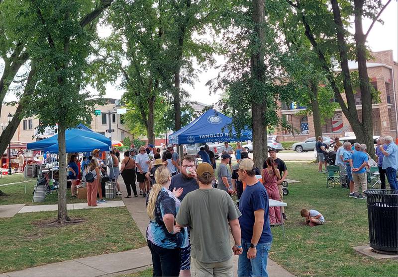 Visitors sample beers, wines and spirits Saturday, July 27, 2024, during the inaugural Drinkin' with Lincoln festival at Washington Square in Ottawa.