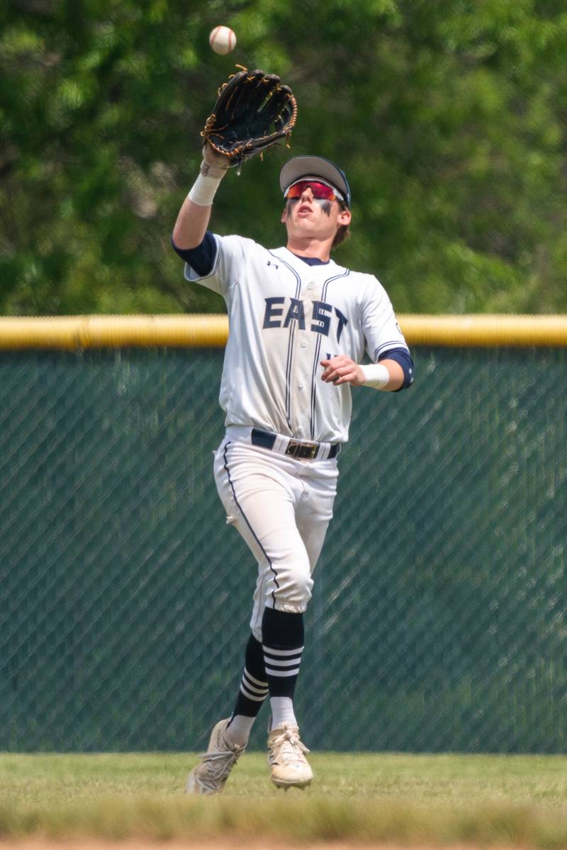 Oswego East's Cody Haynes (13) catches a fly-ball for an out against Waubonsie Valley during the Class 4A Waubonsie Valley Regional final between Waubonsie Valley and Oswego Easy at Waubonsie Valley High School in Aurora on Saturday, May 27, 2023.