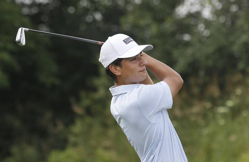 Max Sinha watches his tee shot on the fifth hole during the final round of McHenry County Junior Amateur Golf Tournament  on Tuesday, July 18, 2025, at Foxford Hills Golf Club in Cary.