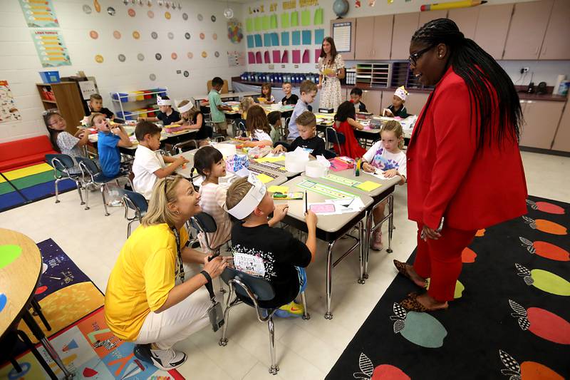District 300 Superintendent Martina Smith (right) and Principal Jennifer Breeze.(left) talk with during first grade students during the first day of school on Tuesday, Aug. 12, 2025, at Westfield Community School in Algonquin.