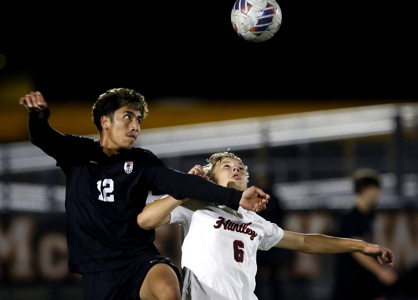 McHenry's Emmanuel Navarrete battles with Huntley's Max Bauer for the ball during a Fox Valley Conference boys soccer match on Thursday, Oct. 9, 2025, at McCracken Field in McHenry.