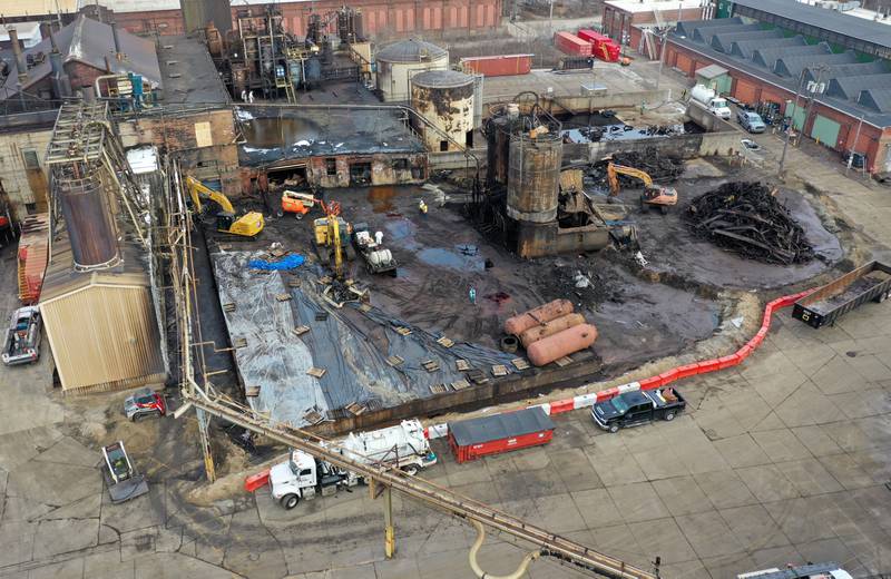 Excavators remove debris from the Carus Chemical fire at the plant on Tuesday, Jan. 24, 2023 in La Salle. A massive fire broke out on Jan. 11, 2023 at the facility. The fire resulted in a substance covering homes, cars, yards and outdoor items that appeared brown-orange, green or purple depending on its state. Carus Chemical and the EPA said the substance was an oxidant called potassium permanganate, which is corrosive, but is mostly non-harmful, unless it is in great concentration. The chemical is distributed by Carus to treat drinking water, among other applications.