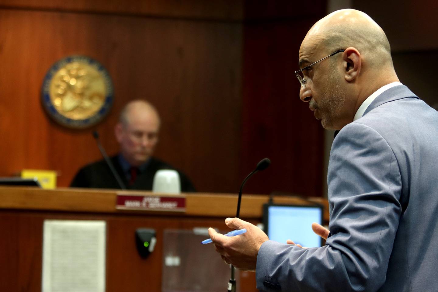 McHenry County State's Attorney's Office prosecutor Ashur Youash speaks during a hearing for defendants Colin Scott, left, and Michael Penkava, center, Thursday, Dec. 16, 2021, at the Michael J. Sullivan Judicial Center in Woodstock.