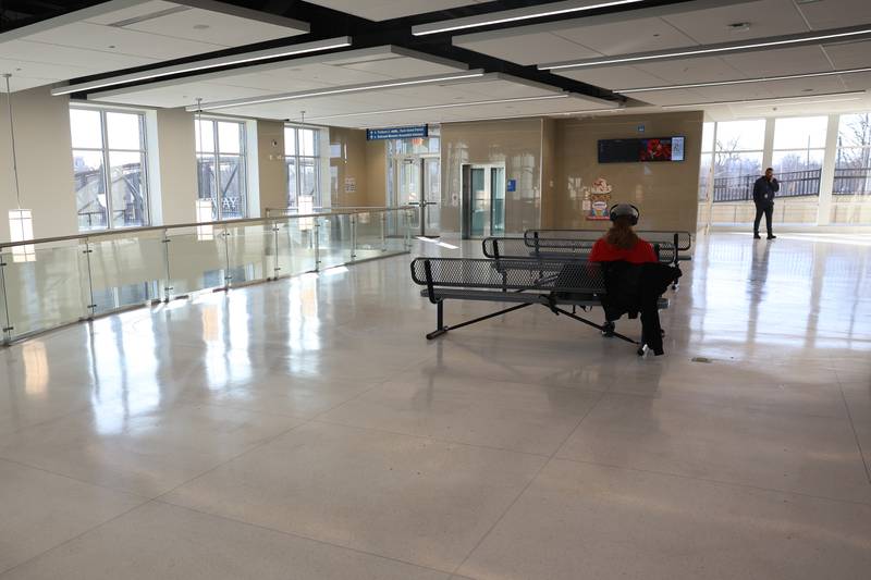 Several people wait inside at the Joliet Gateway Center as due to the extreme cold weather on Friday, Jan 23, 2026 in Joliet.