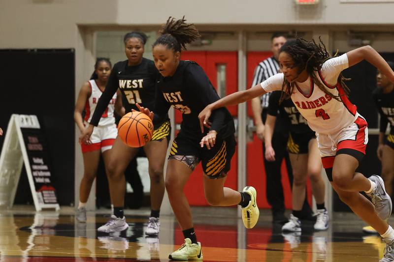 Joliet West’s Makayla Chism takes the loose ball upcourt against Bolingbrook on Thursday, Jan 23, 2025 in Bolingbrook.
