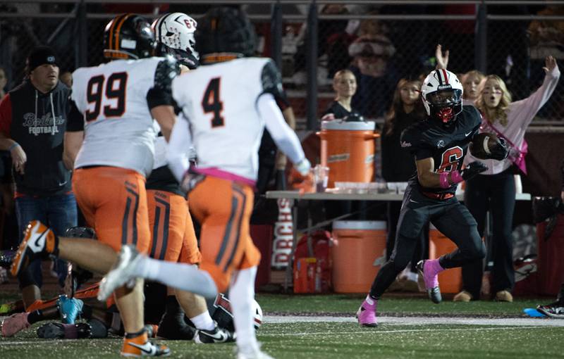Bradley-Bourbonnais' Rontez Smith, right, carries the ball after a reception in a game against Dekalb on Friday, October 10, 2025.