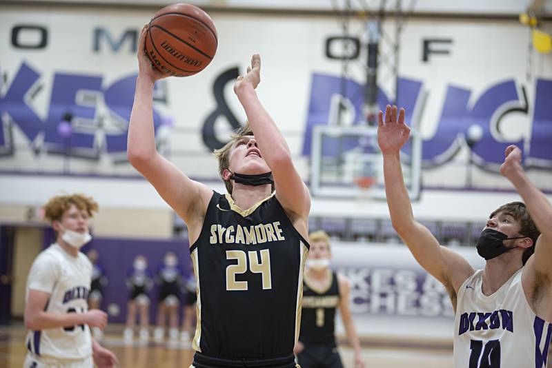 Sycamore's Lucas Winburn puts up a shot against Dixon on Tuesday, Jan. 25, 2022.