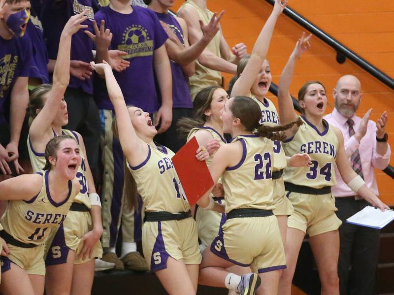 Members of the Serena girls basketball team react after hitting a three-point basket over St. Bede during the Class 1A Sectional final game on Thursday, Feb. 22, 2024 at Gardner-South Wilmington High School.
