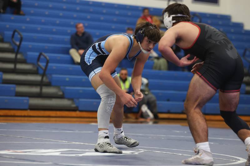 Plainfield South’s Chase Peirceall faces off with Plainfield North’s Sam Zito in a Southwest Prairie dual meet on Wednesday, Nov. 29, 2023 in Plainfield.