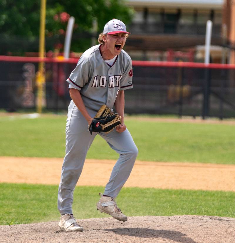 Plainfield North's Kash Koslowski (8) reacts after striking out a Yorkville batter to end the game during the Class 4A Yorkville Regional baseball final at Yorkville High School on Saturday, May 28, 2022.