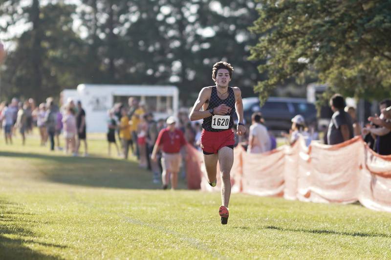 Benet’s Finn Richards takes first place in the Eddington cross country invitational at Kaneland High School in Maple Park on Saturday, Sep 21, 2024.