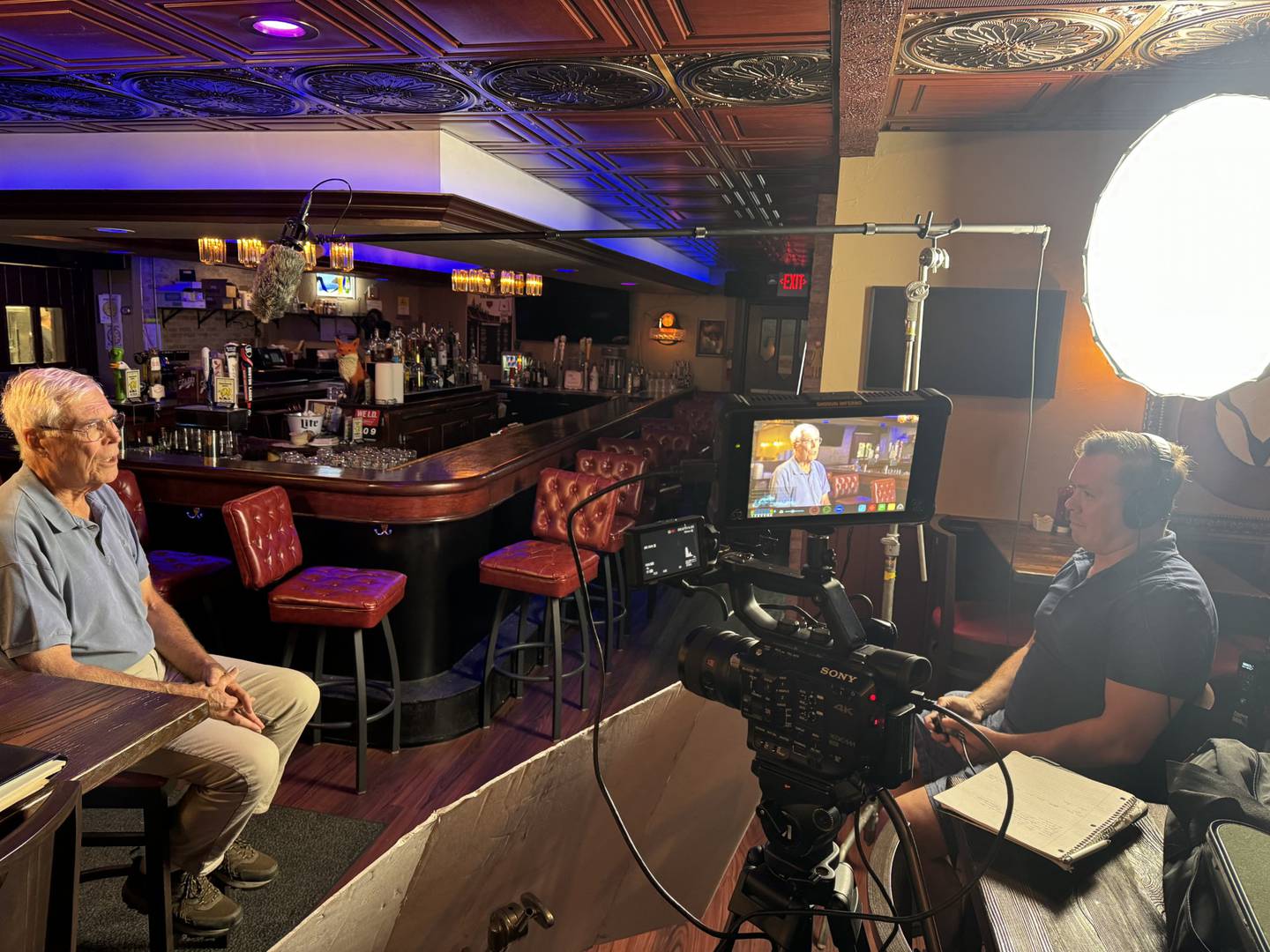 Retired history teacher Craig Pfannkuche is interviewed at the Foxhole Pizza and Pub as part of the History of McHenry IL: Prohibition Era. Released Tuesday, Nov. 26, 2024, on the McHenry Landmark Commission Facebook page, the video is part of a series planned by the commission.