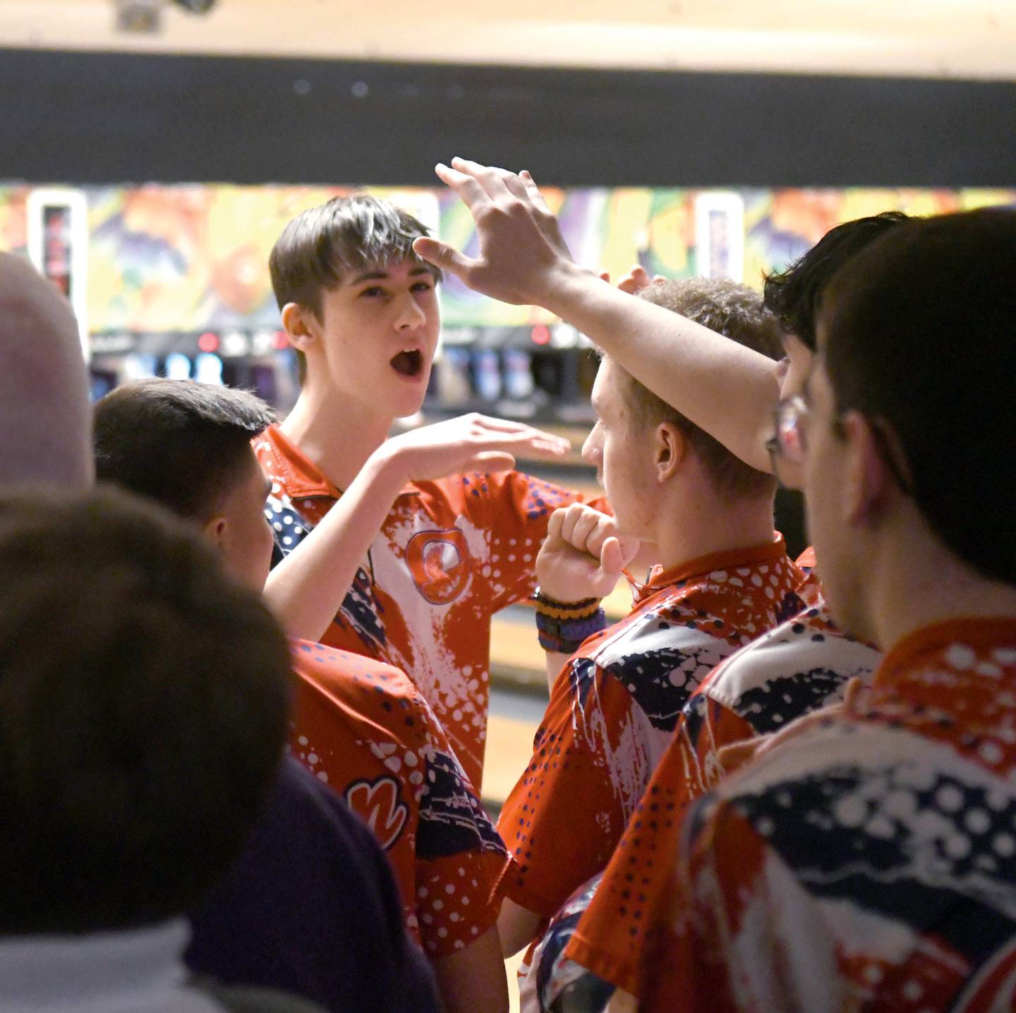 Oregon's Gavvin Surmo celebrates a strike with his team during the IHSA bowling sectional at Don Carter Lanes in Rockford on Saturday, Jan. 21.