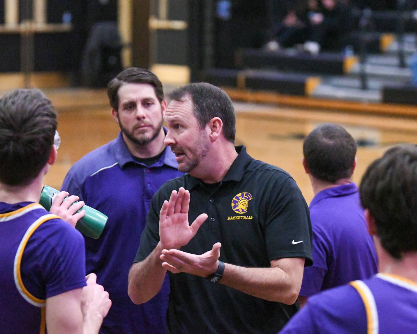 Mendota's head coach Steve Wasmer talks with the team during at timeout on Wednesday Dec. 17, 2025, while traveling to take on Sycamore High school.