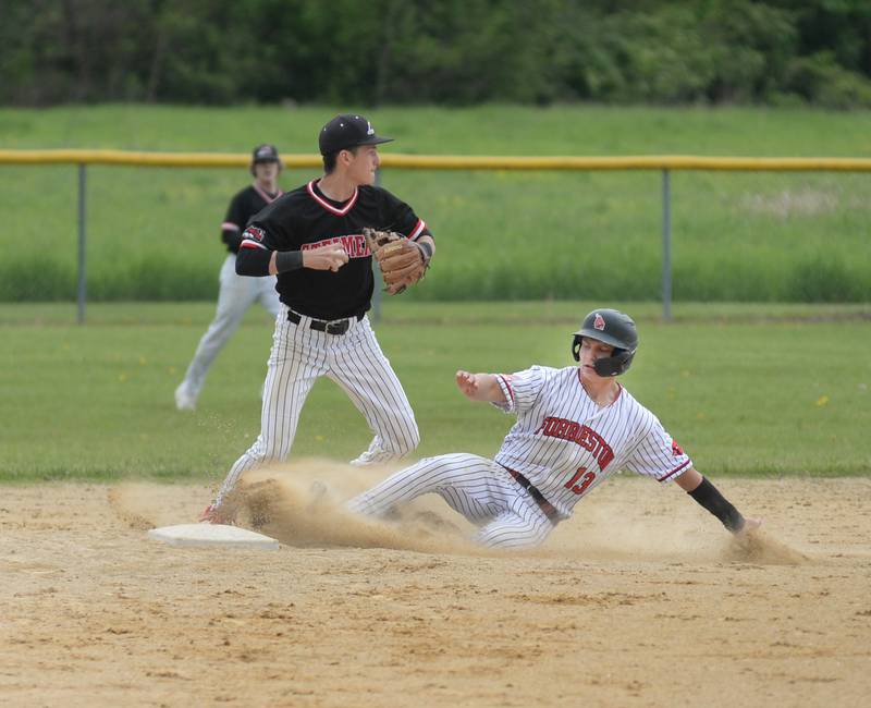 Forreston's Kendall Erdmann is forced out at second as Fulton's Braeden Brennan steps on the bag for the first part of a double play in first inning action at the 1A Amboy Regional on Saturday, May 24, 2025.