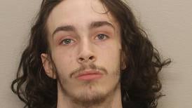 Man held on charges of running away from Ogle County deputies while carrying loaded, stolen handgun