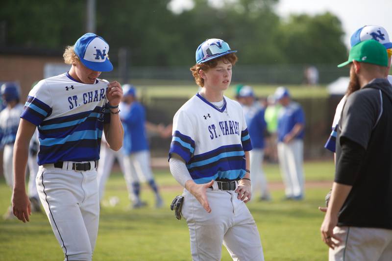 St. Charles players react to the loss against York at the Class 4A Sectional Final on Friday May 31, 2024 in St. Charles.