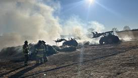 Photos: Firefighters battle hay bale fire at Ogle County farm