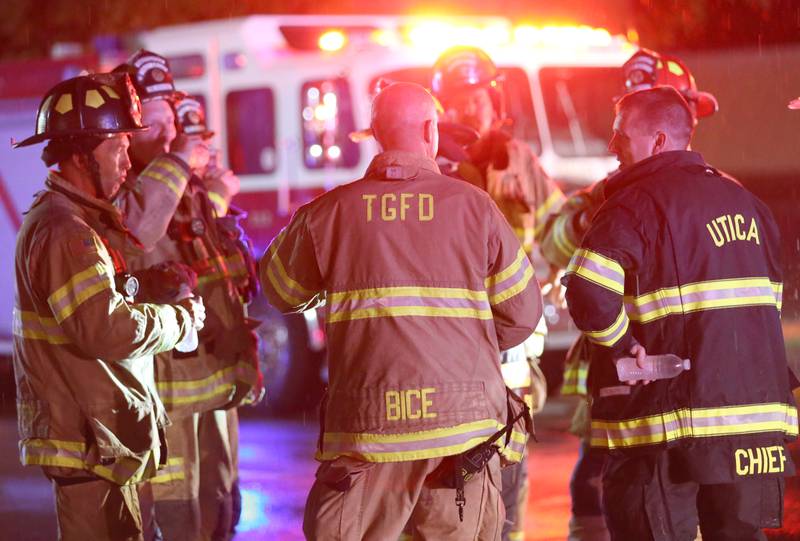 Firefighter gather at Walnut and 5th Streets to fight a fire across from the Westclox building on Friday, July 14, 2023 in Peru. The fire began at 8:19p.m. A MABAS box alarm was issued to the fourth level and then brought back down after the fire was contained.