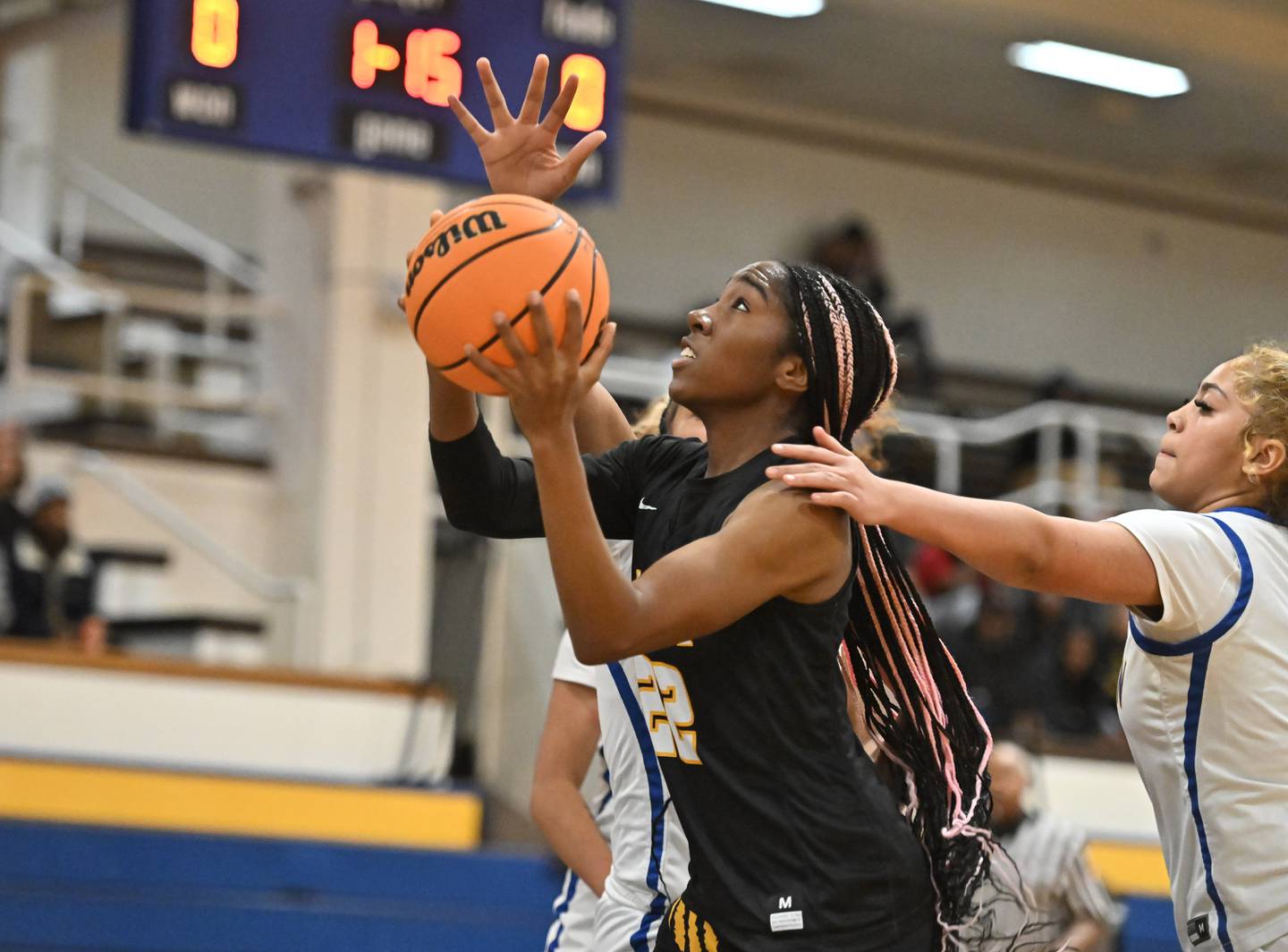 Joliet West's Makayla Chism (22) goes strong to the basket during the non-conference basketball game against Joliet Central on Monday, Dec 02, 2024 at Joliet.