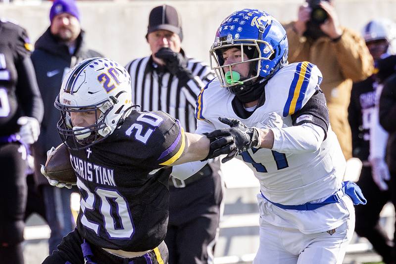 Chicago Christian's Kenny Jager heads for the end zone against Maroa-Forsyth's Owen Smith Friday, Nov. 29, 2024, in the class 2A football state final.