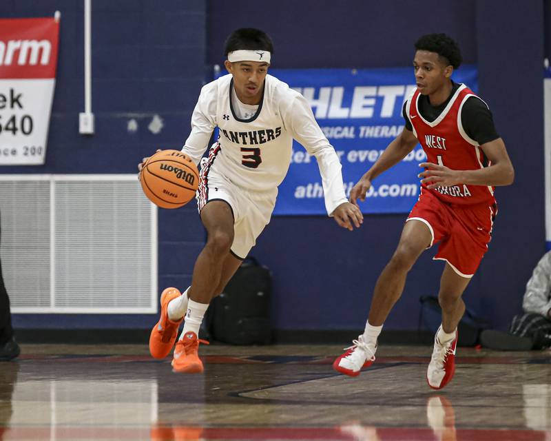 Oswego's Ethan Vahl (3) drives down the court during their basketball game between West Aurora at Oswego Monday, Nov 24, 2025 in Oswego.