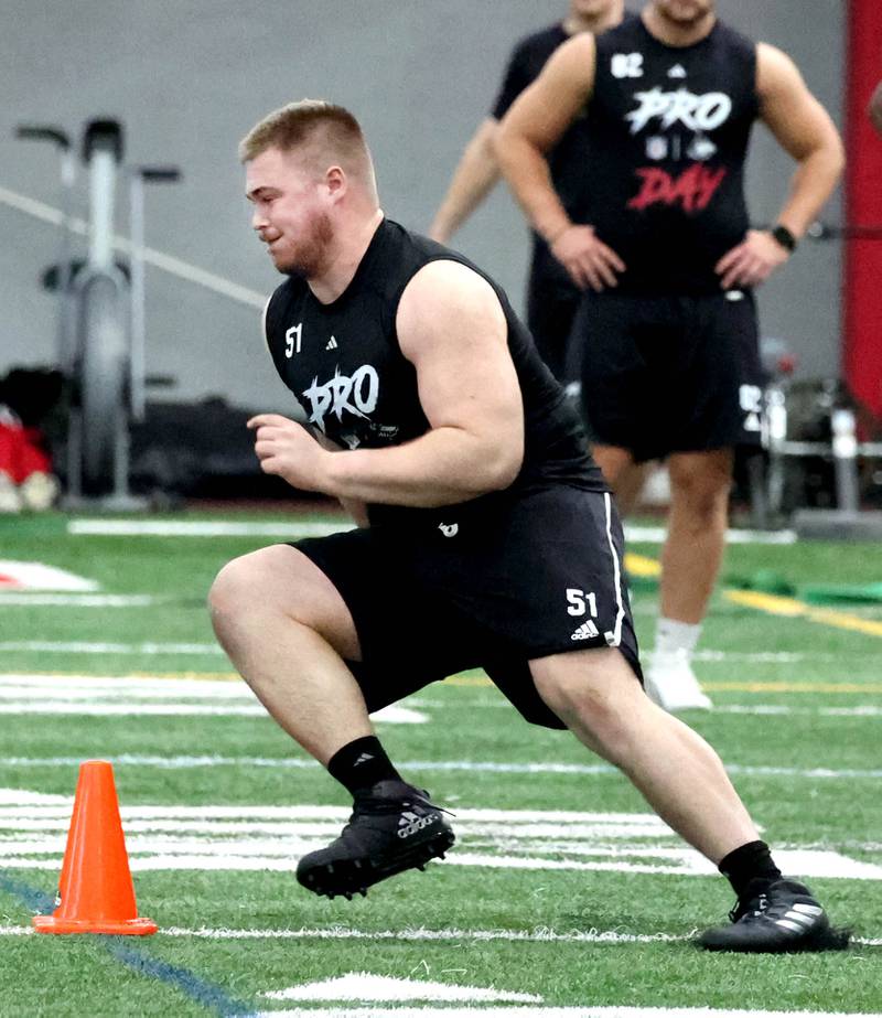 Former Northern Illinois University defensive tackle Cade Haberman runs a shuttle drill for NFL scouts during pro day Monday, March 17, 2025, in the Chessick Practice Center at NIU in DeKalb.
