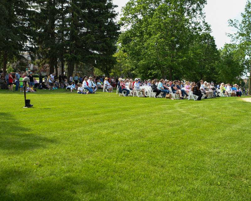 Spectators fill the law at the Ellwood House lawn Monday May 30th during the Memorial Day ceremony in DeKalb.