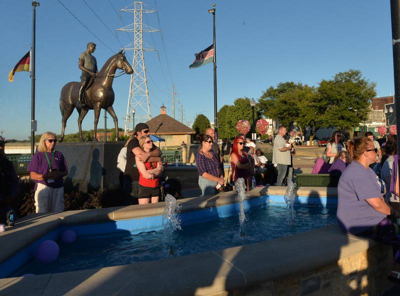 Attendees at Sauk Valley Voices of Recovery Overdose Awareness event in Dixon on Thursday, Aug. 31, 2023, listen as speakers talk about addiction and overdose.