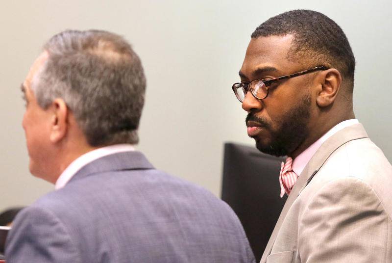 Corey Butler (right) and his new attorney Gene Ognibene appear in front of Judge Robbin Stuckert at the DeKalb County Courthouse Wednesday during a pretrial hearing. Butler is expected to stand trial for possession of child pornography and dissemination of child pornography.