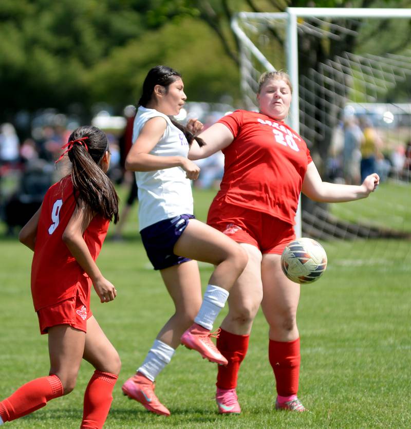 Oregon's Noelle Girton (20) battles a Rochelle player for the ball on Saturday, May 10, 2025 at Oregon Park West.