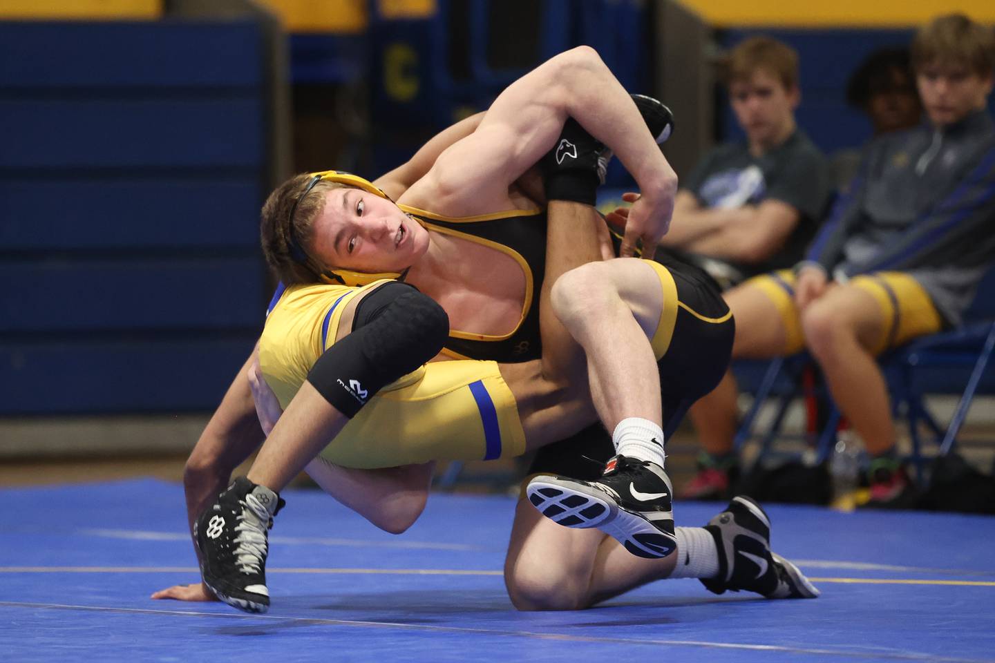 Joliet West’s Carson Weber drops Joliet Central’s Yamil Cotto in the 150-pound weight match at Joliet Central on Friday, Jan 31, 2025.
