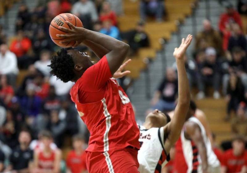 Palatine’s Tony Balanganayi shoots the ball during the Jack Tosh Holiday Classic semifinals against Bolingbrook at York High School in Elmhurst on Friday, Dec. 29, 2023.