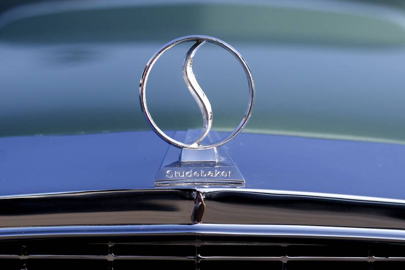 The hood ornament of a 1964 Studebaker GT Hawk on Wednesday July 10, 2024, during the Cary Cruise Night. The weekly car show hosted by the Cary-Grove Area Chamber of Commerce draws about 125 cars and trucks each week. The event runs weekly on Wednesday through the end of August.