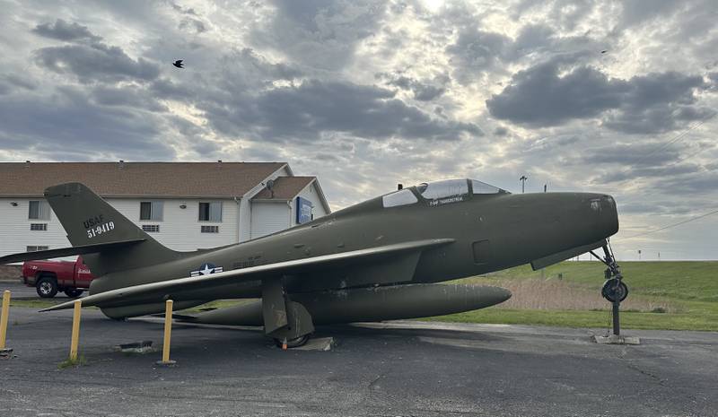 This F-84F Thunderstreak is located in the parking lot in front of the Americas Best Value Inn on Friday, May 5, 2023 in Wenona. The F-84F Thunderstreak is a swept-wing turbojet fighter-bomber from the 1940's and 1950s.