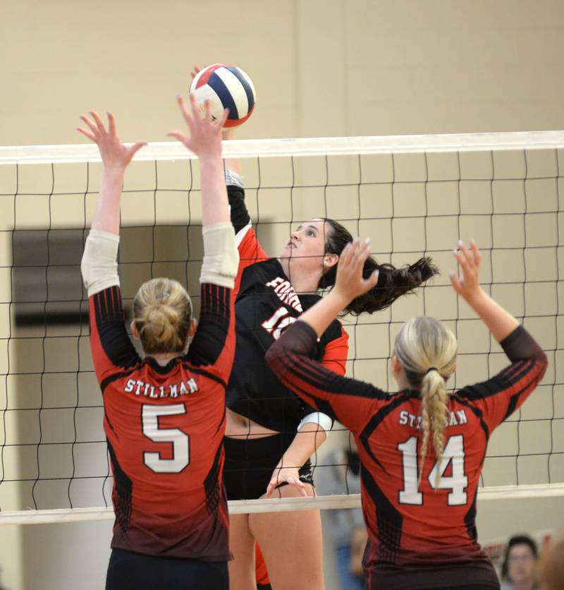 Forreston's Jaiden Schneiderman (10) spikes against Stillman Valley's Aleigha Hodge (5) and Ava Janssen (14) at the Oregon Volleyball Tournament on Saturday, Sept. 7, 2024.