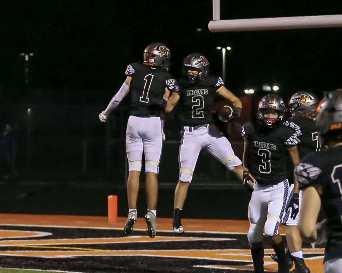 Minooka's Joey Partridge (2) celebrates his touchdown run during varsity football game between Oswego East at Minooka.  Sept 30, 2022