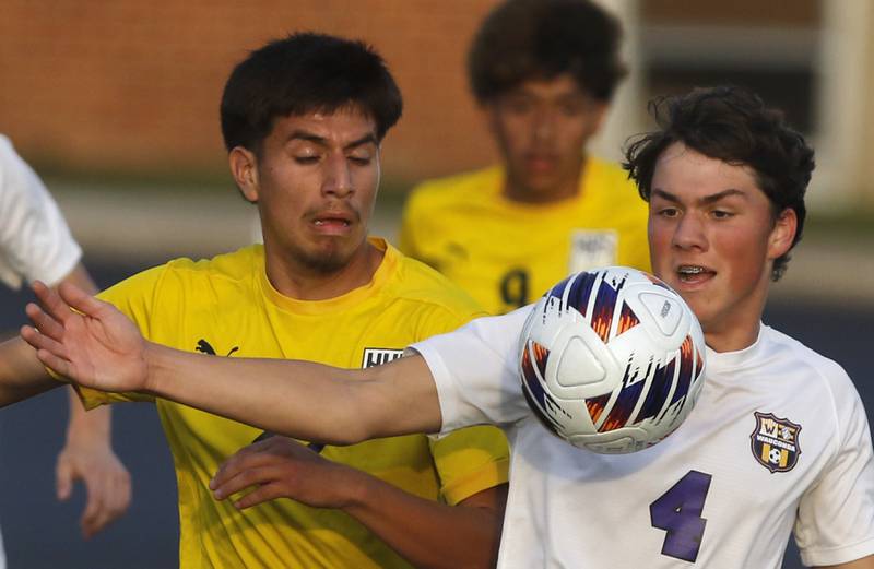 Wauconda's Daniel Karecki tries to keep Harvard's William Salgado from getting to the ball during the IHSA Boys Soccer 2A Grayslake Central Sectional semifinal match on Tuesday, Oct. 29, 2024, at Grayslake Central High School,