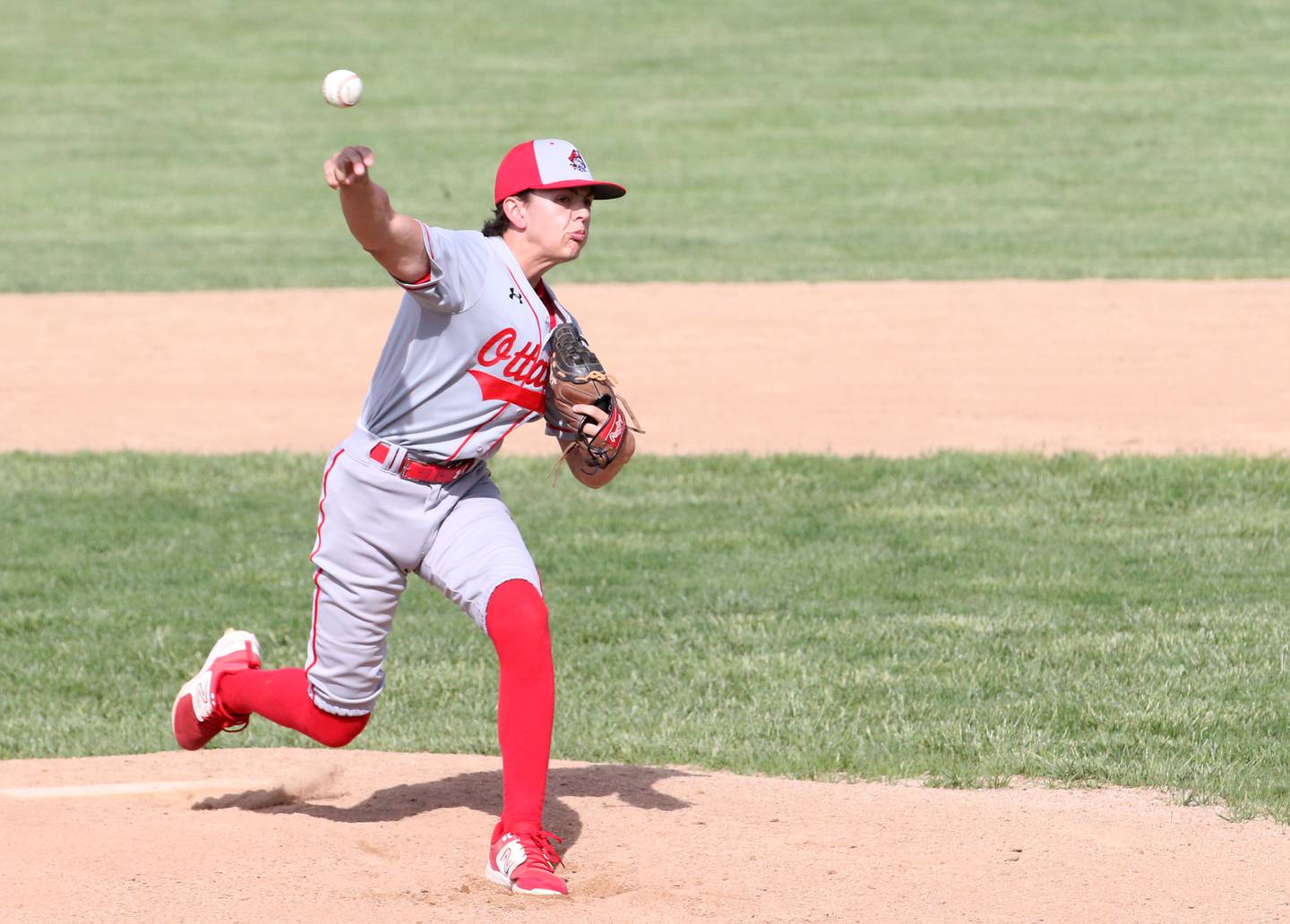 Ottawa's Camden Loomis delivers a pitch to Streator on Tuesday, May 16, 2023 at Streator High School.