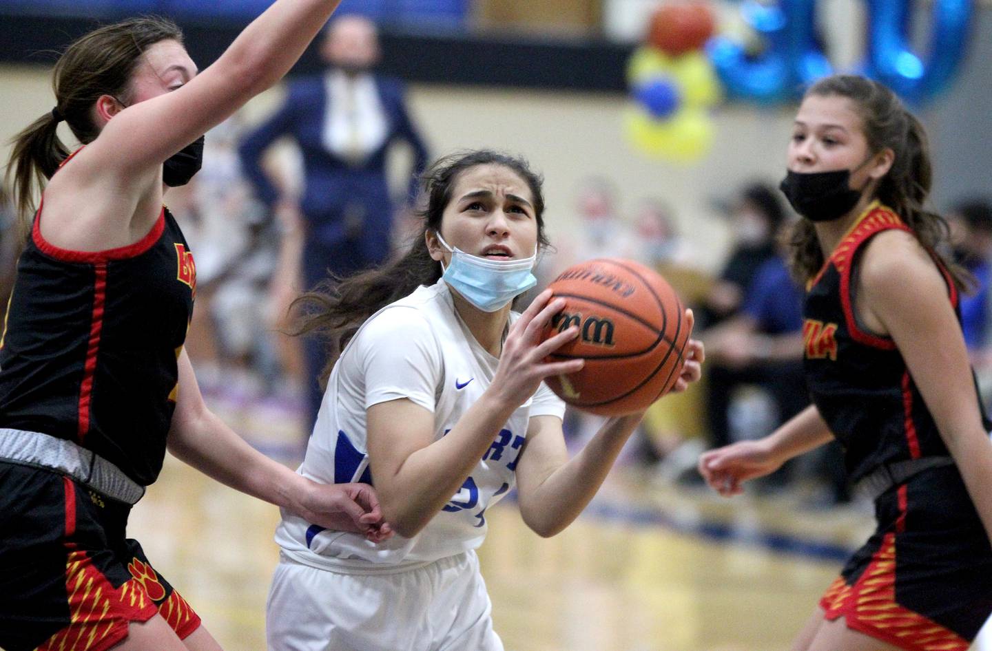Wheaton North's Sara Abdul looks for an opening during a home game against Batavia on Thursday, Jan. 20, 2022.